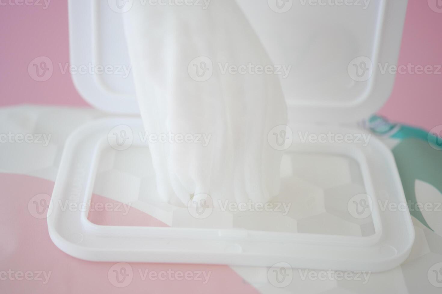 Cleansing wet wipes on table with copy space photo