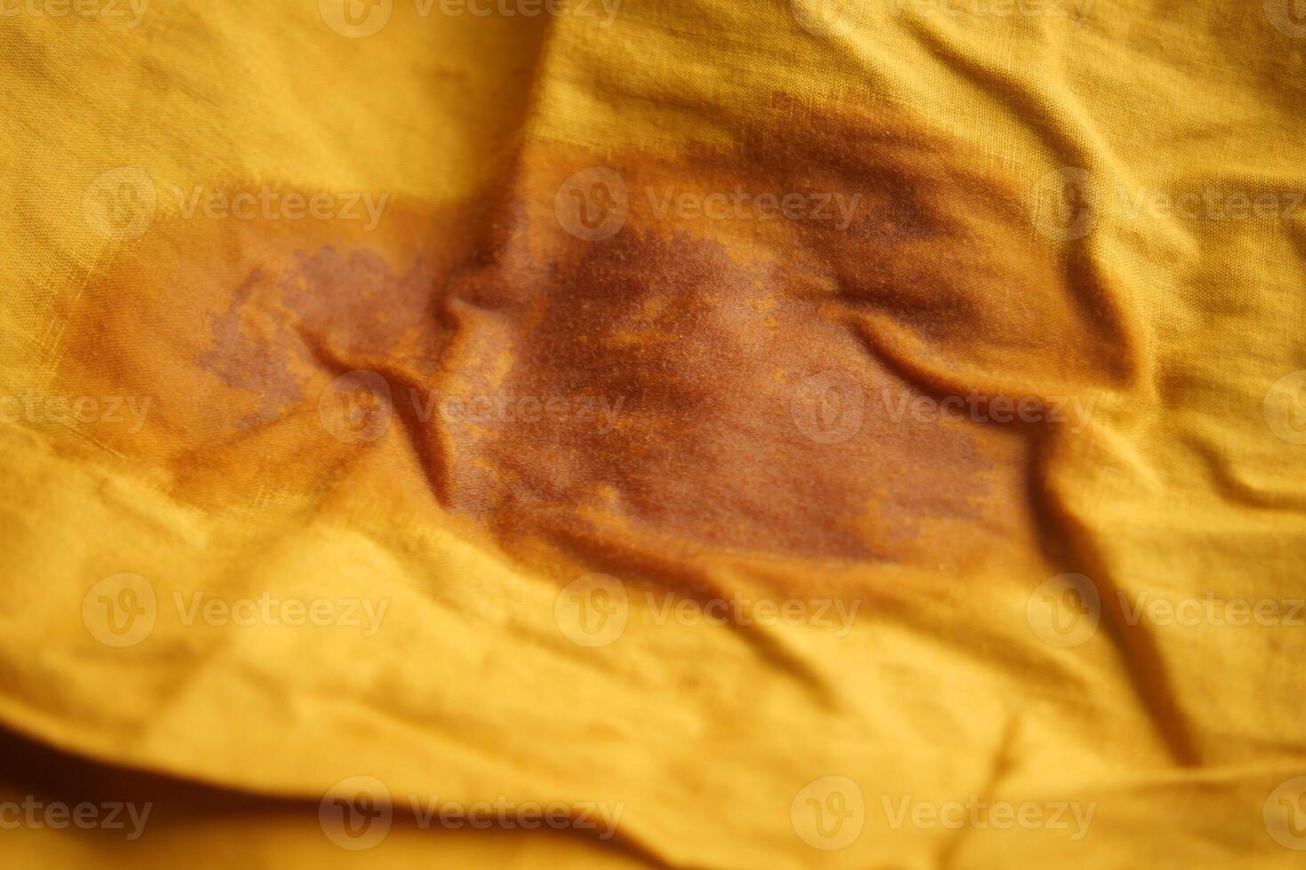 Oil stain on purple color cloth. photo
