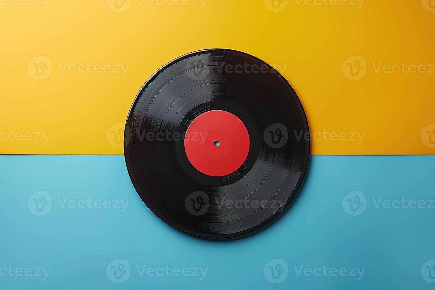 top view one vinyl record on blue and yellow background flatlay in retro style photo