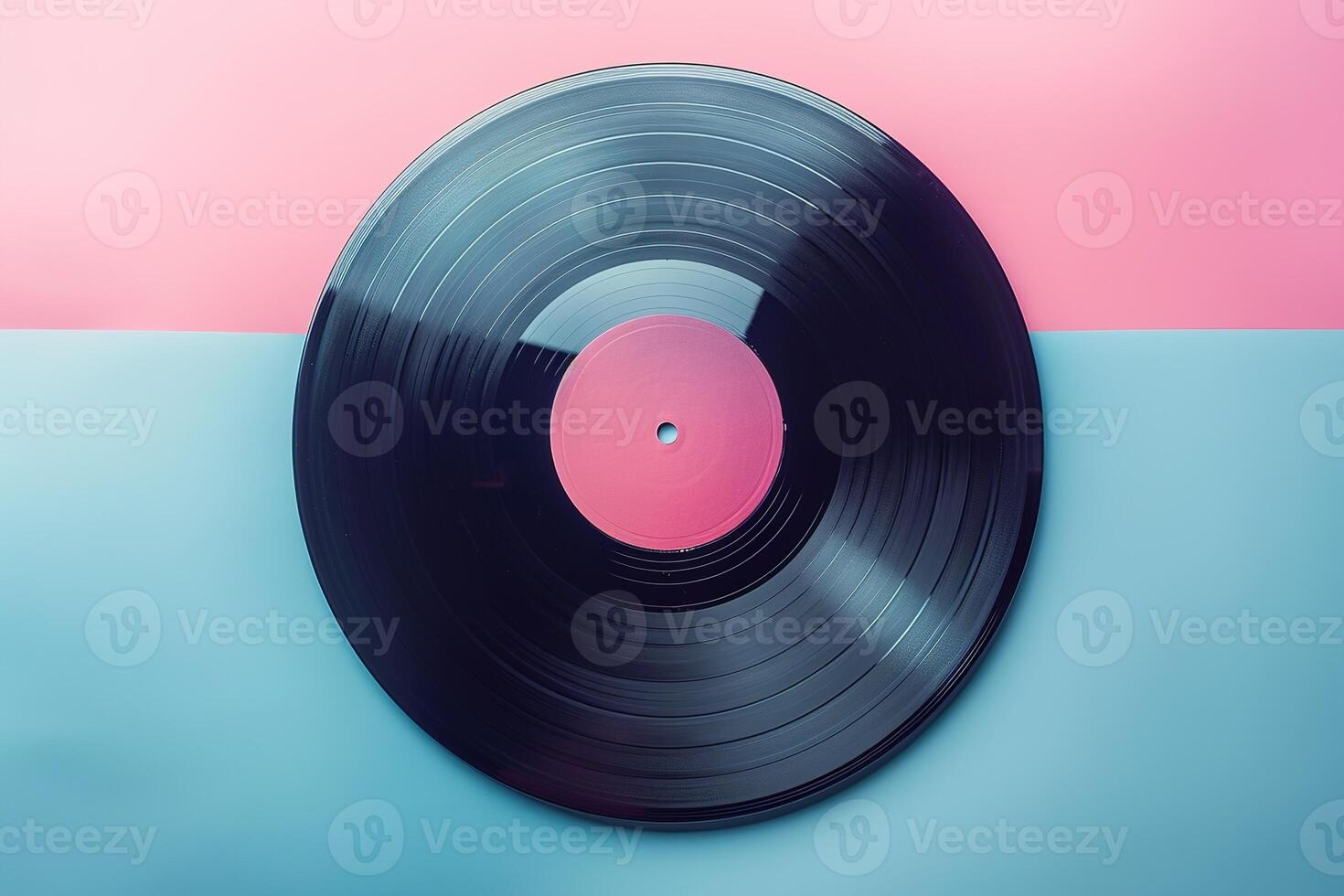 vertical image top view one vinyl record on blue and pink background flatlay in retro style photo