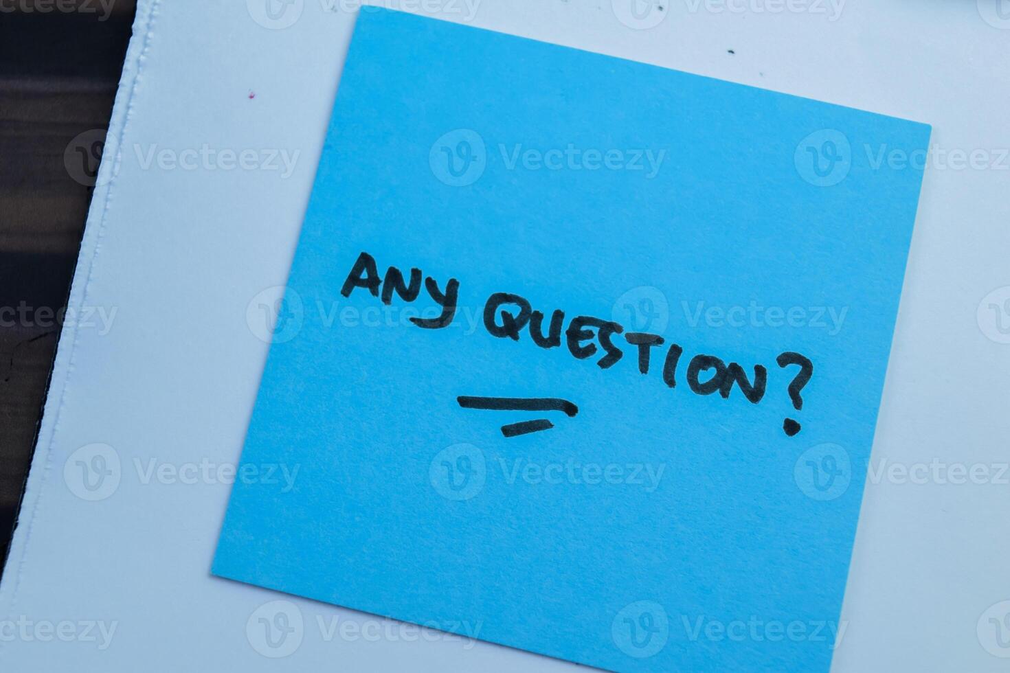 Concept of Any Question write on sticky notes isolated on Wooden Table. photo