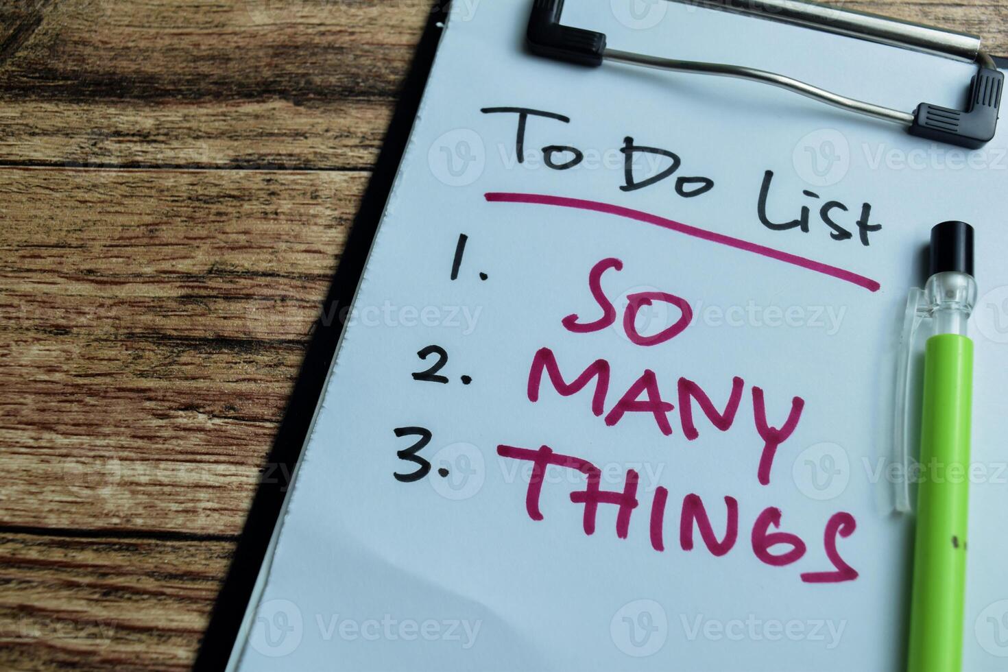 Concept of To do List - So Many Things write on paperwork isolated on wooden background. photo