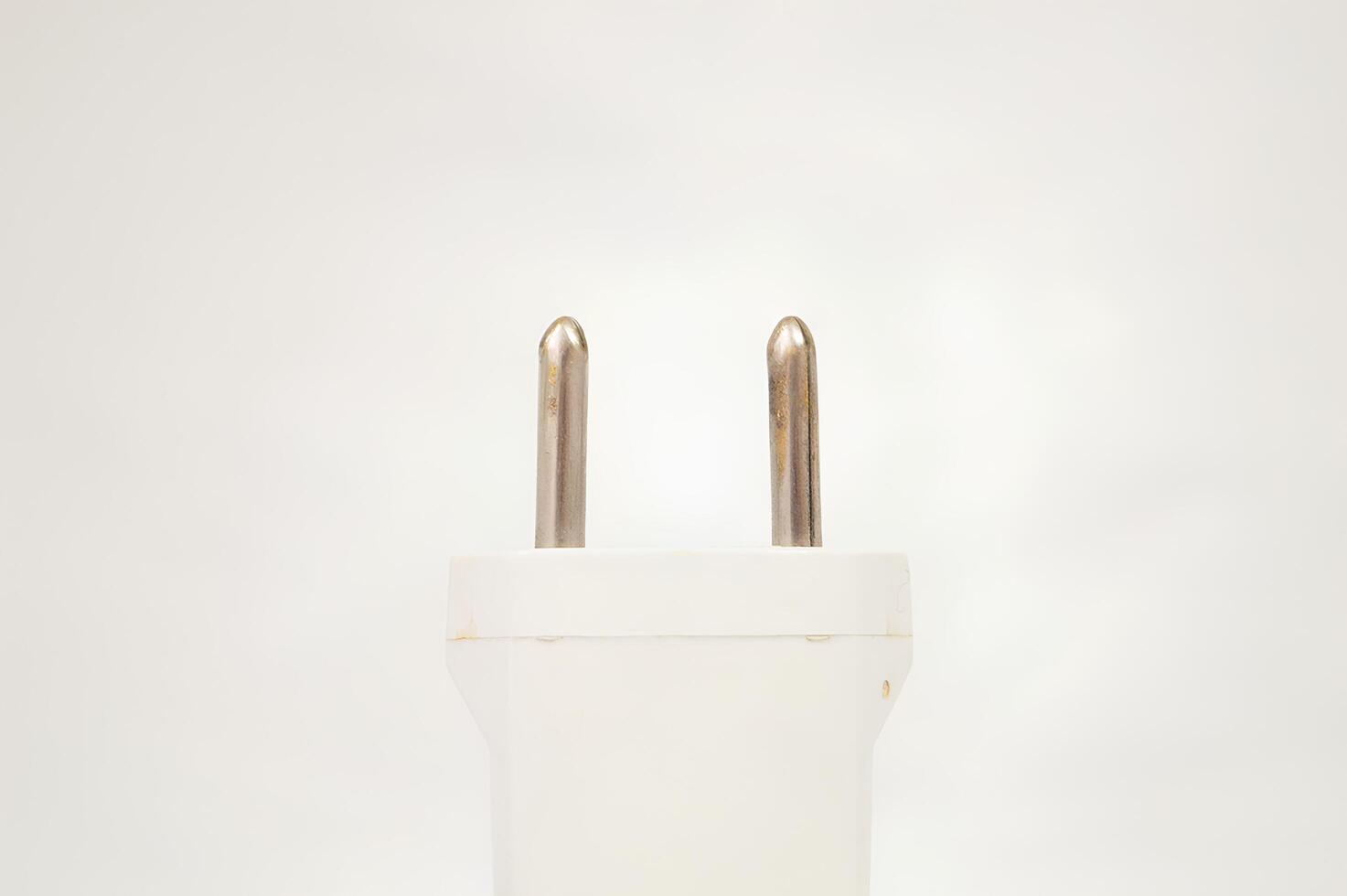 Close-Up of a White Power Plug photo