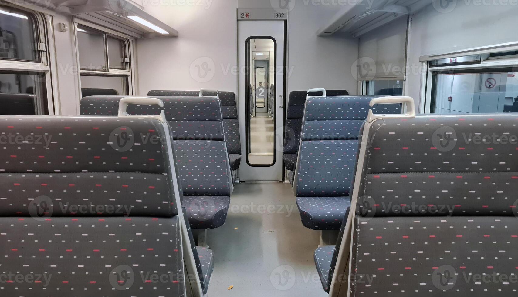 Experience Comfortable Long-Distance Travel in an Empty Class 2 Train Carriage photo