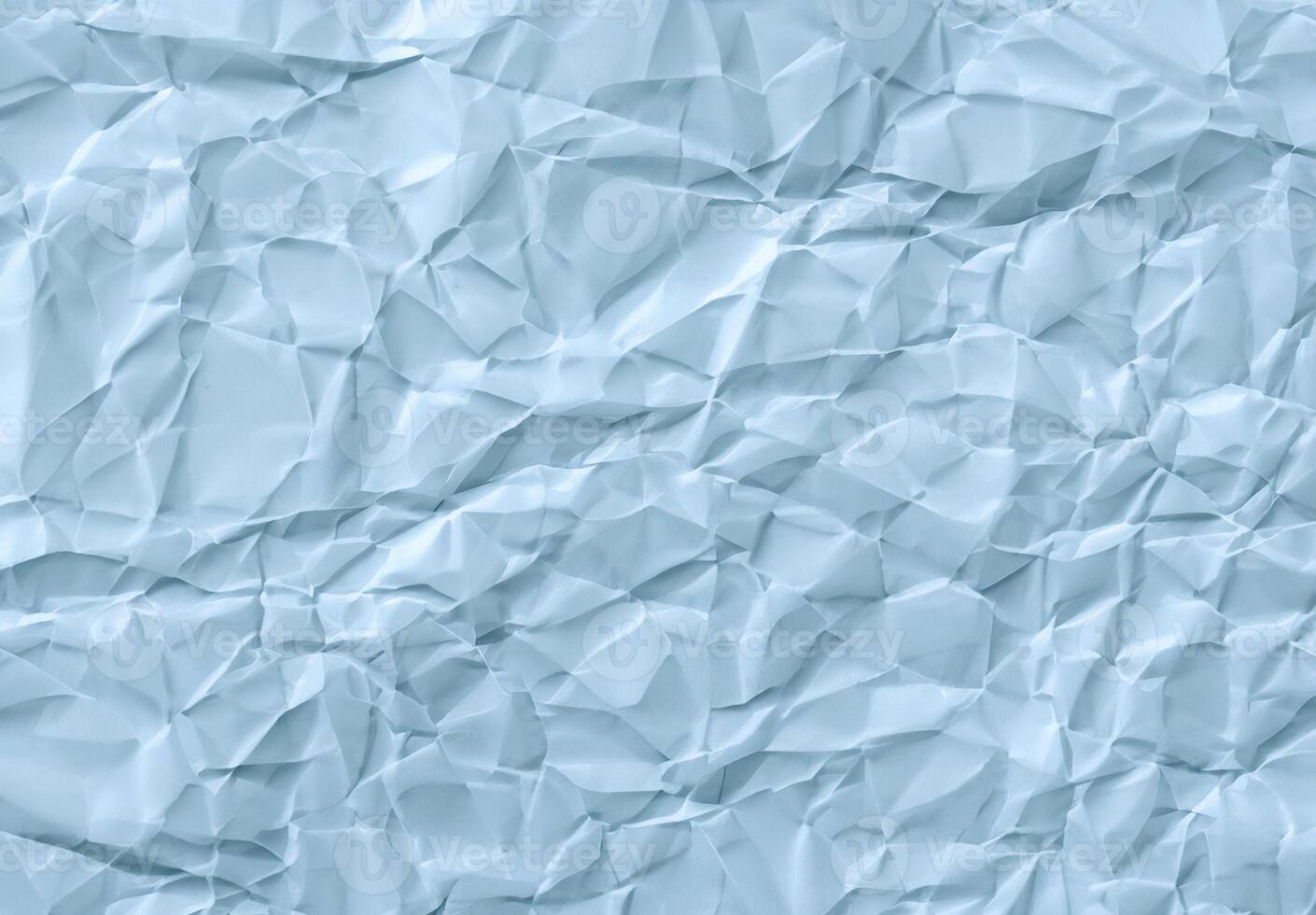 Texture Matters. Discover the Impact of Crumpled Blue Paper in Design photo