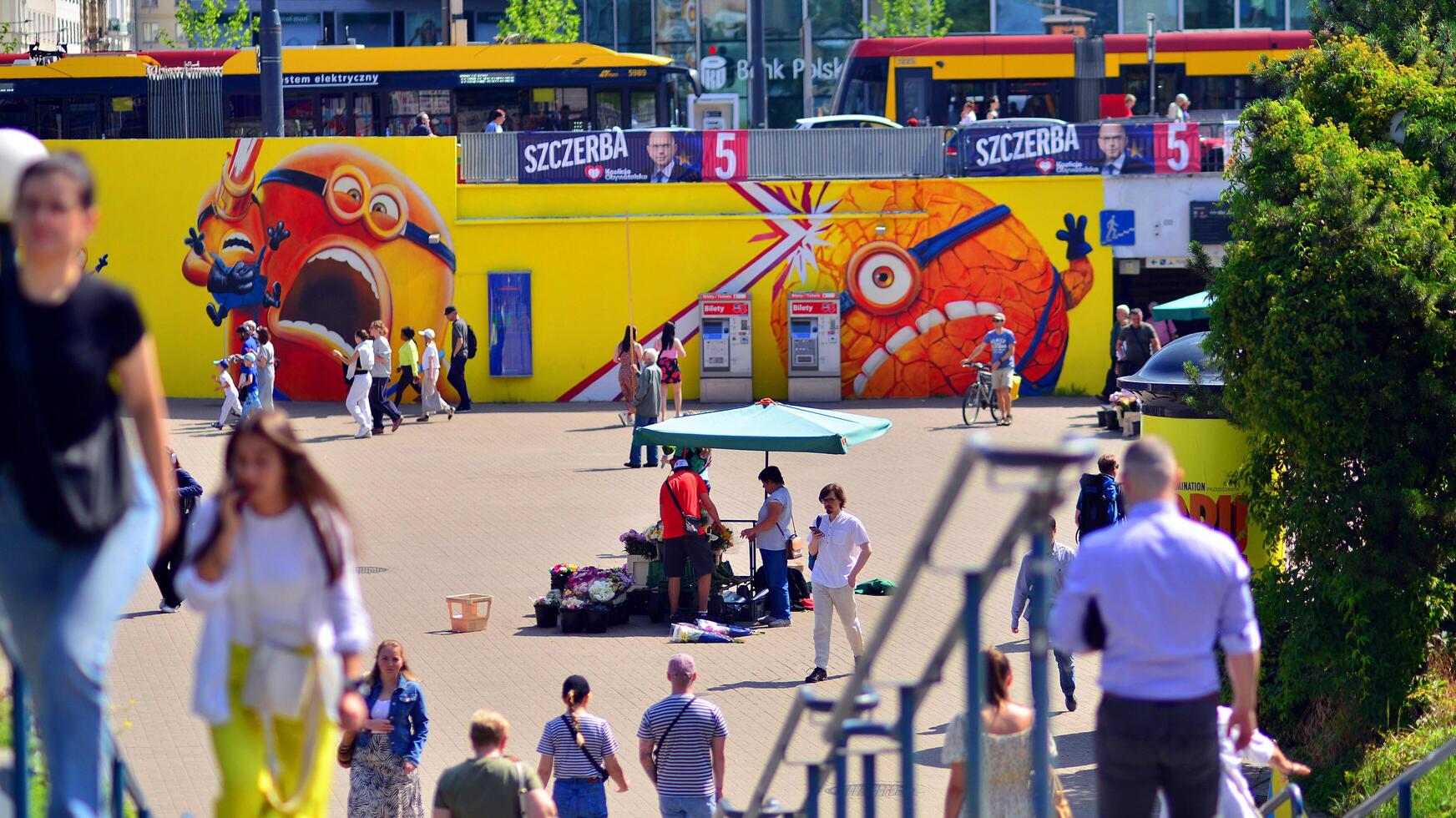 Warsaw, Poland. 8 June 2024. Crowd of people on Patelnia square in centrum city. The colloquial name. An important communication point on the city map with residents, tourists and buildings. photo