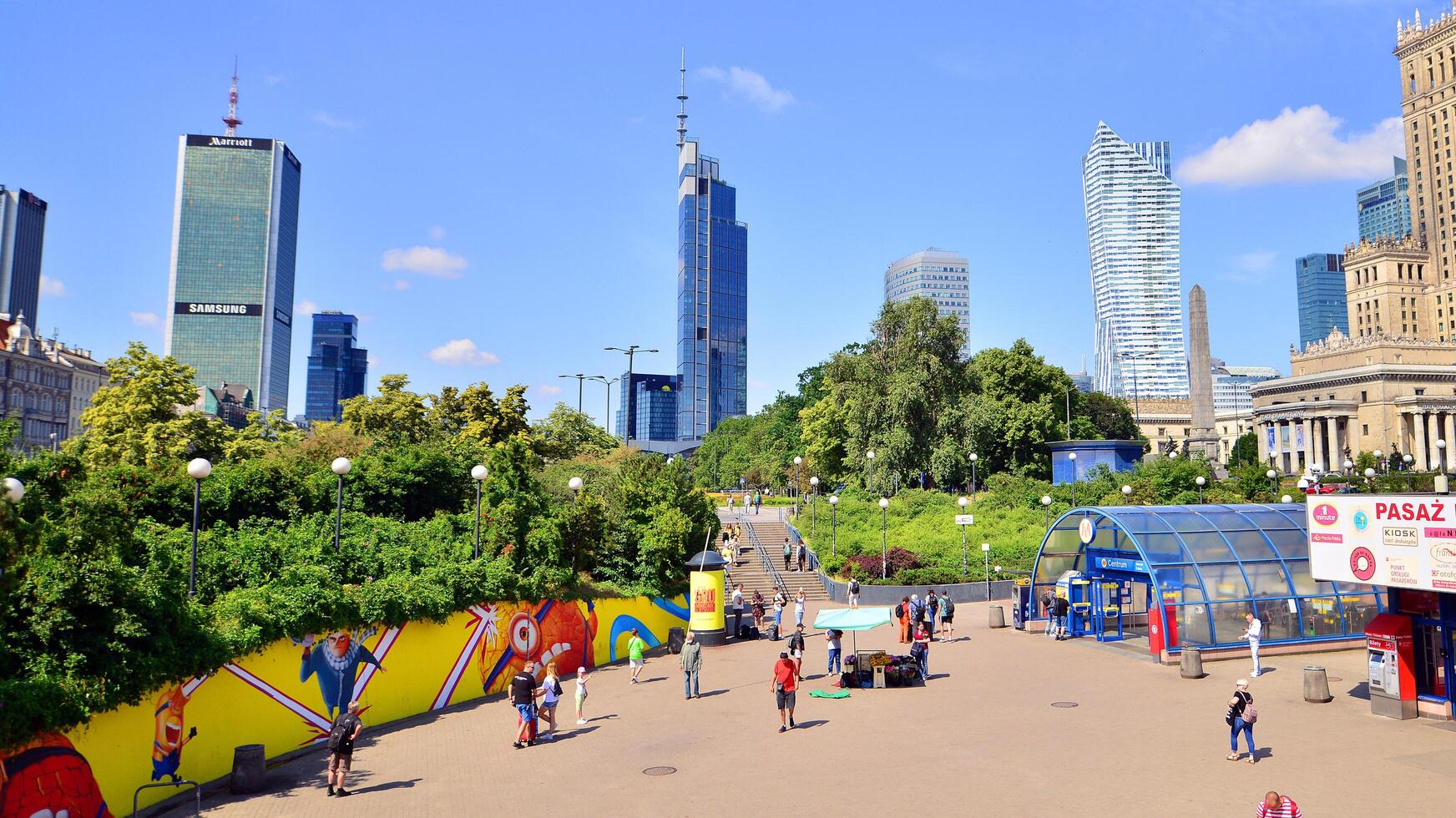 Warsaw, Poland. 8 June 2024. Crowd of people on Patelnia square in centrum city. The colloquial name. An important communication point on the city map with residents, tourists and buildings. photo