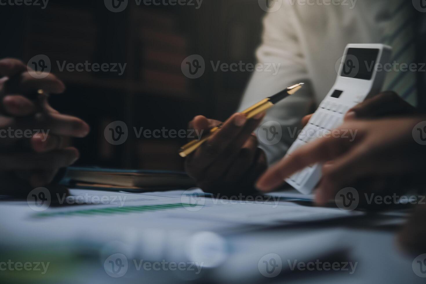 Business team meeting present, investor colleagues consultation and conference new strategy plan business and market growth on financial document graph report, Meeting and Talking. photo