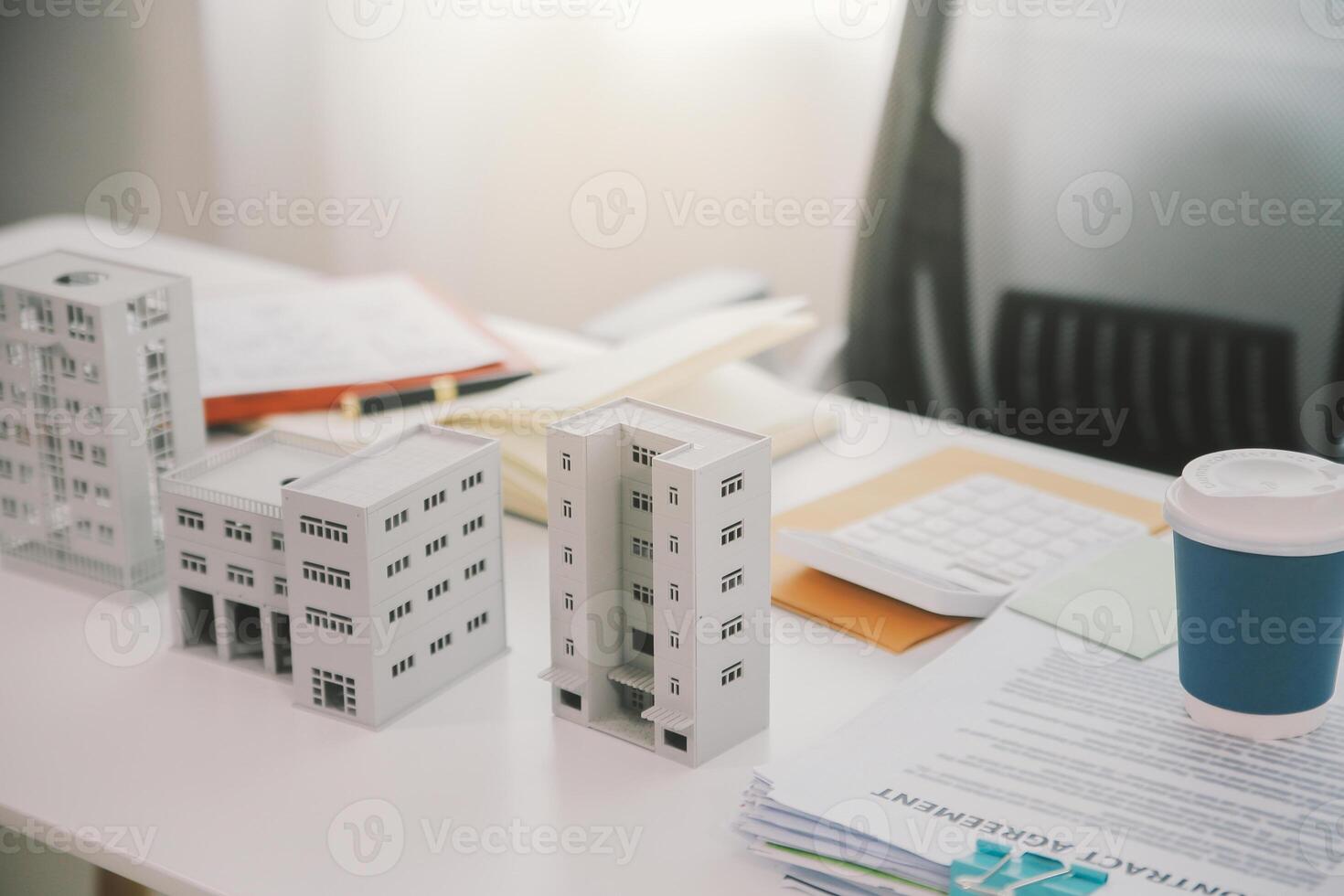 Real estate agent talked about the terms of the home purchase agreement and asked the customer to sign the documents to make the contract legally, Home sales and home insurance concept. photo