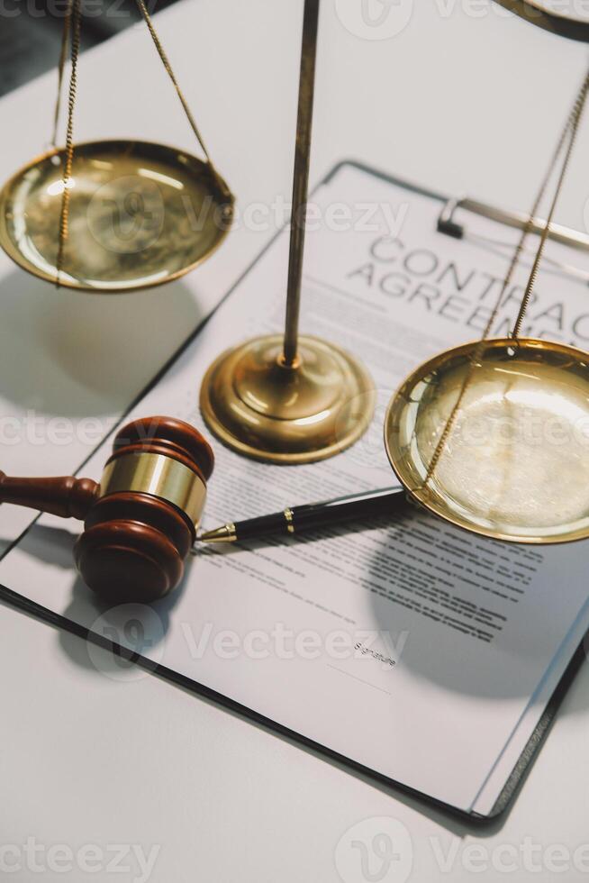 Lawyer, legal advisor, businessman brainstorming information on agreement details Business contracts in legal processing books for accuracy in contract documents. joint financial investment. photo