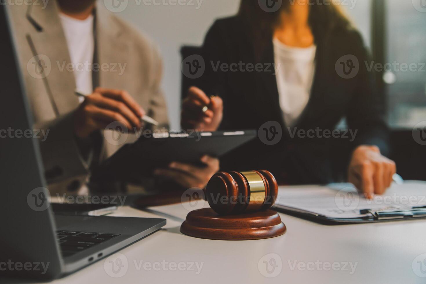 Lawyer, legal advisor, businessman brainstorming information on agreement details Business contracts in legal processing books for accuracy in contract documents. joint financial investment. photo