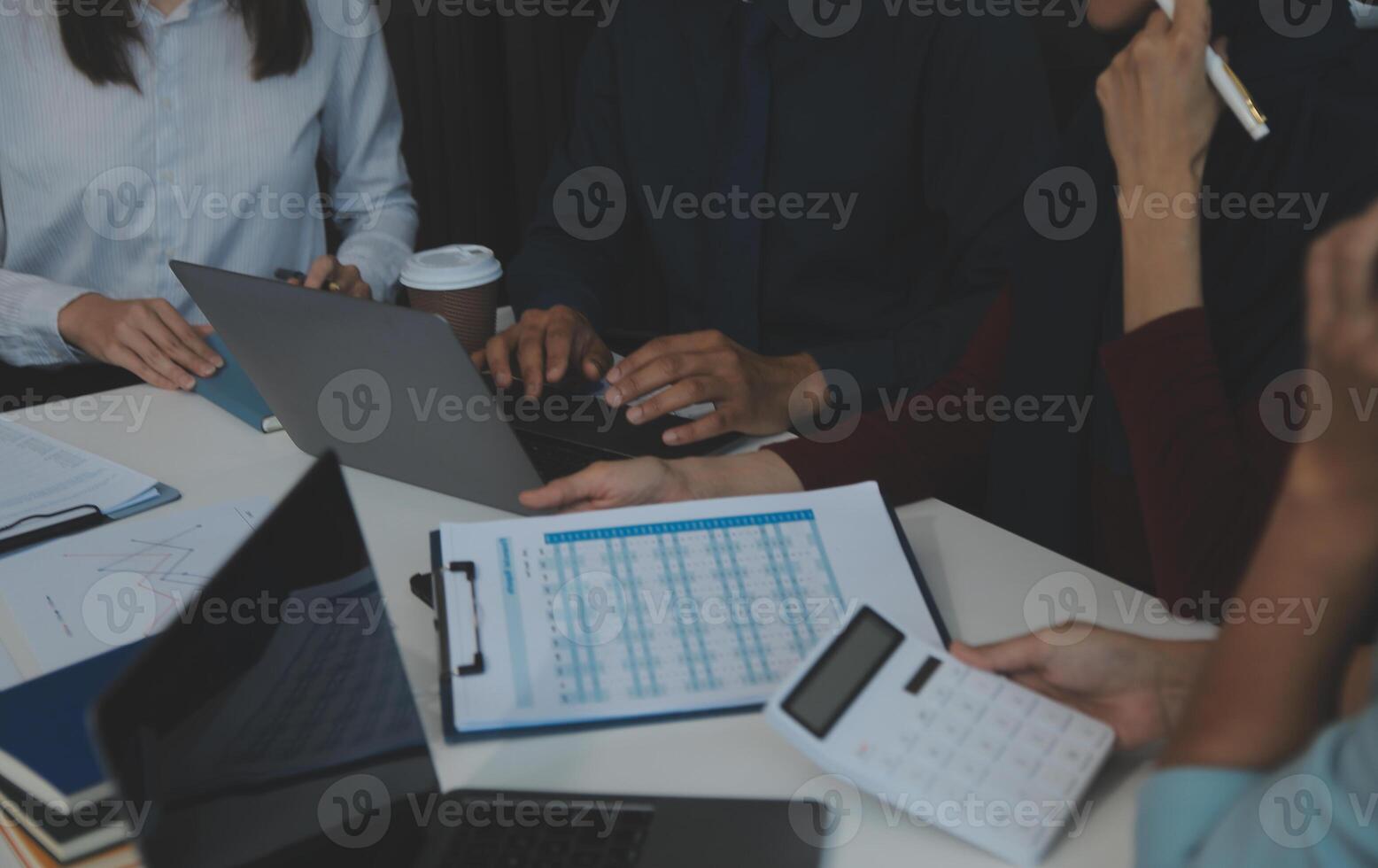 Team of business people working together in the meeting room office, teamwork background charts and graphs banner, double exposure successful teamwork,business planning concept. photo