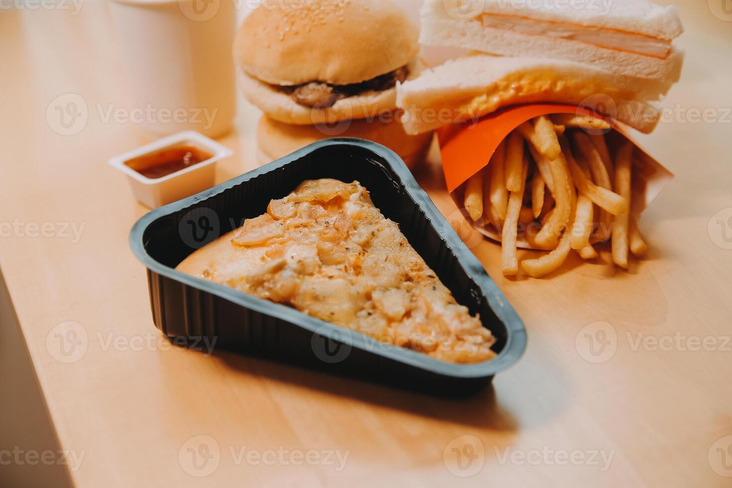 Multiple type of Fast food on table. photo