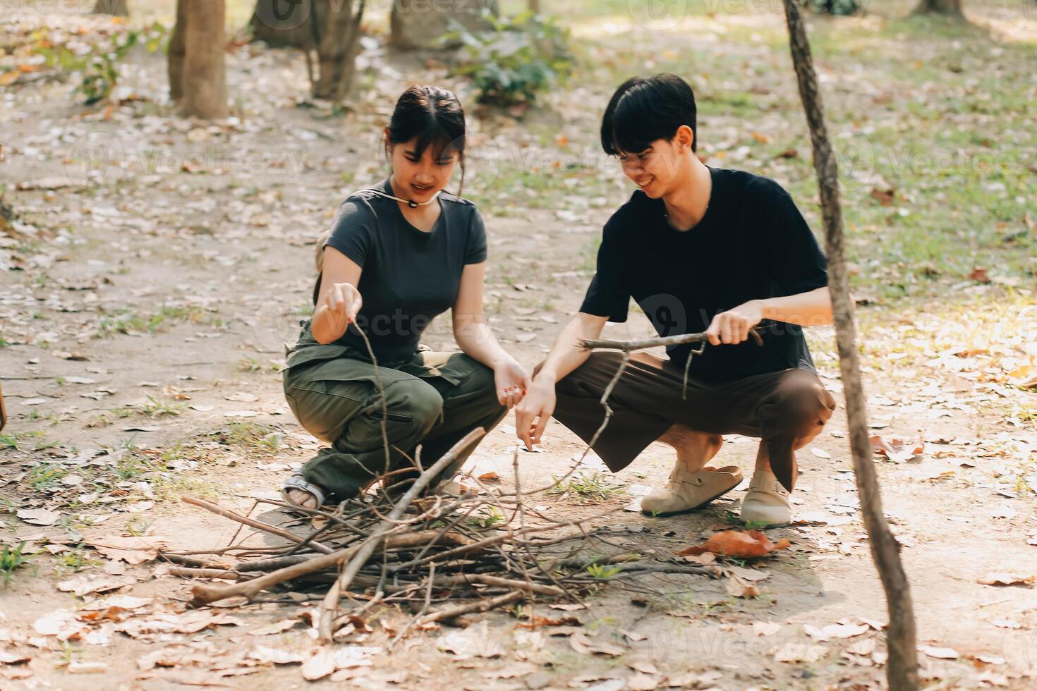 Asian couple sweet in tent inside on they camping trip, traveller relax and sleep togather in out door and camping trip photo