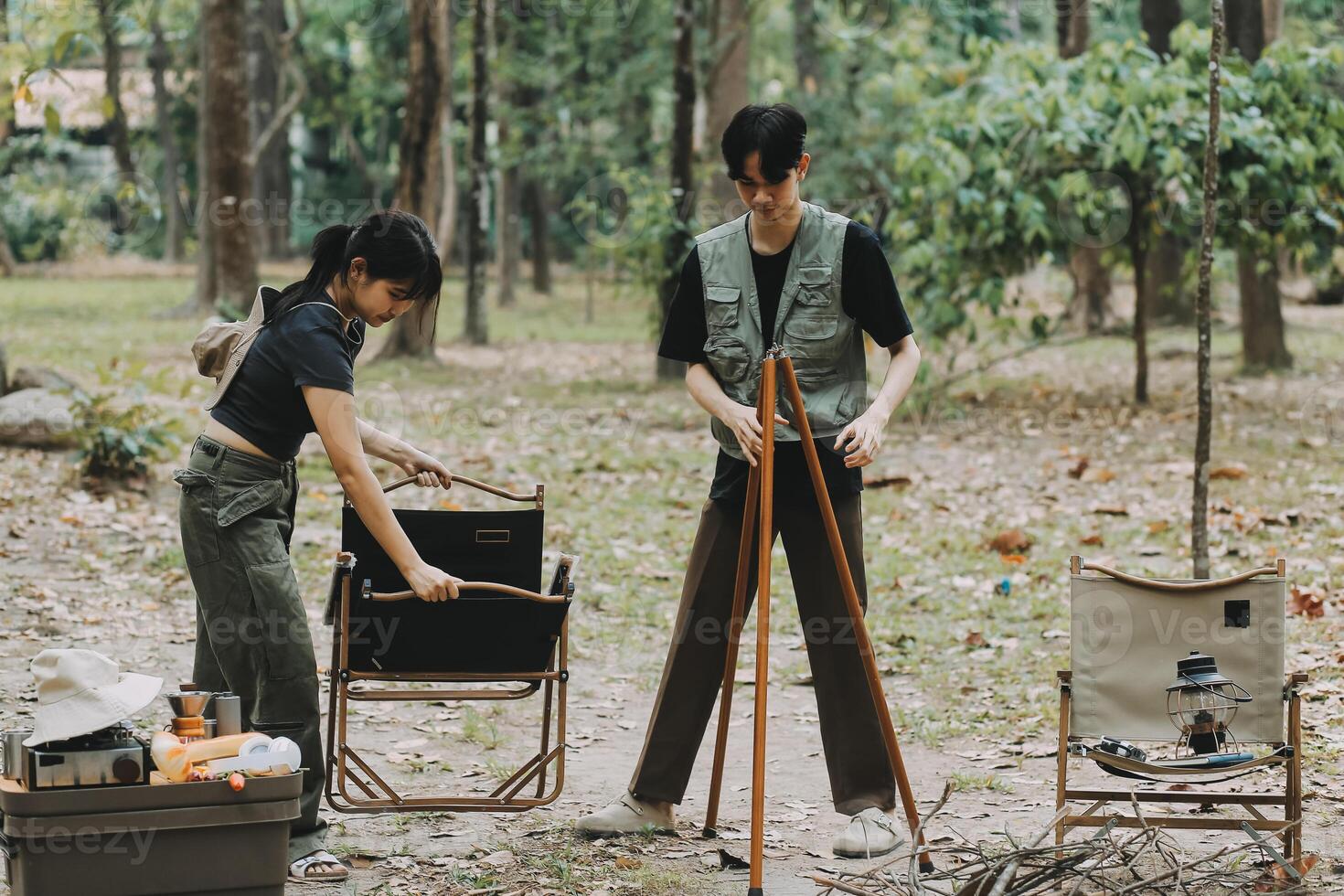 Asian couple sweet in tent inside on they camping trip, traveller relax and sleep togather in out door and camping trip photo