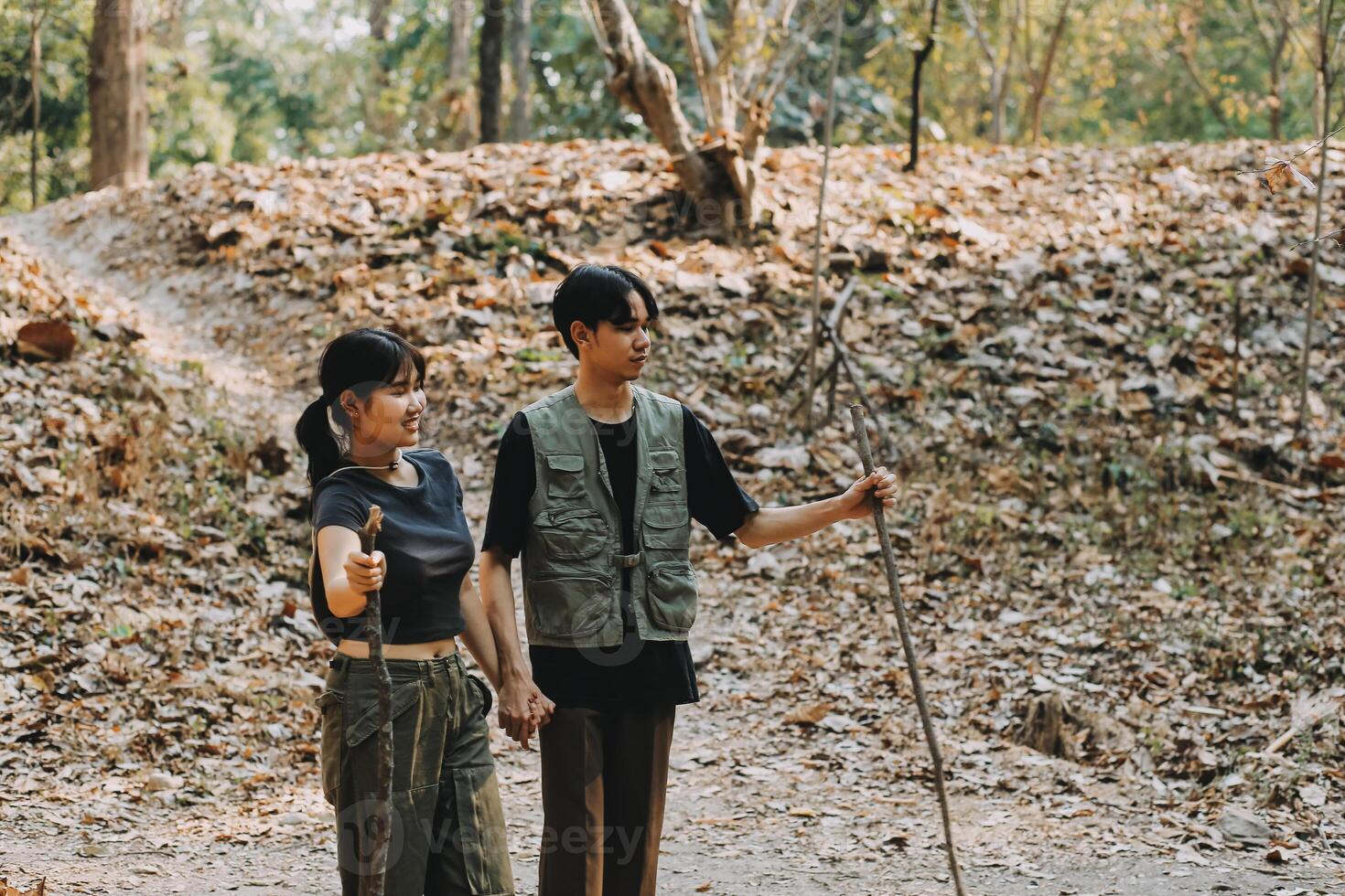 Asian couple sweet in tent inside on they camping trip, traveller relax and sleep togather in out door and camping trip photo