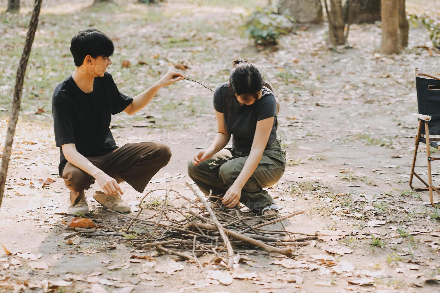 Asian couple sweet in tent inside on they camping trip, traveller relax and sleep togather in out door and camping trip photo