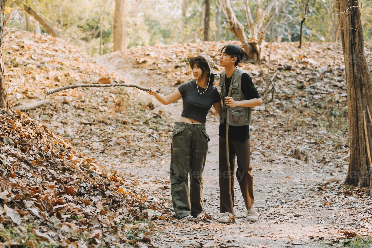 Asian couple sweet in tent inside on they camping trip, traveller relax and sleep togather in out door and camping trip photo