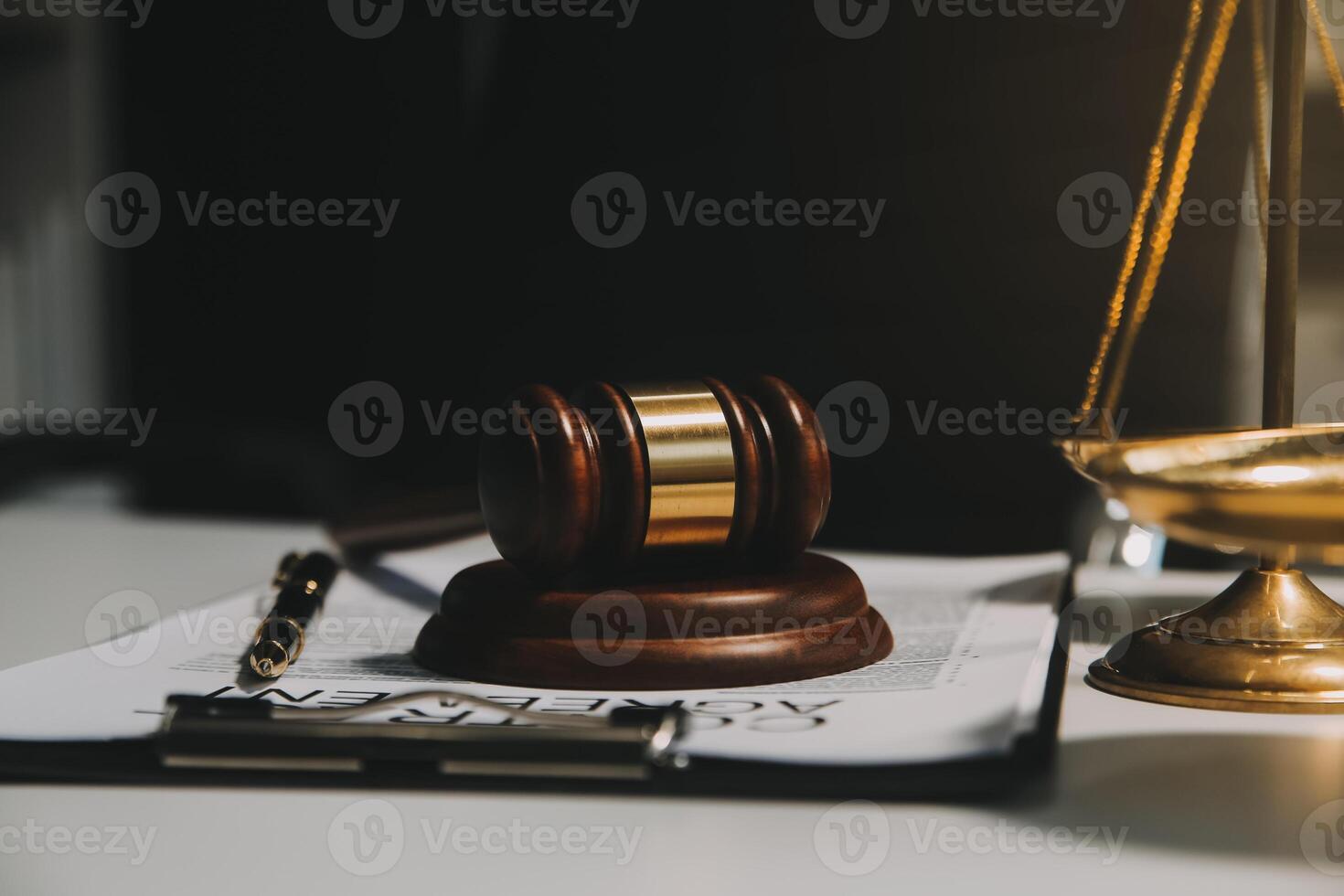 Lawyer, legal advisor, businessman brainstorming information on agreement details Business contracts in legal processing books for accuracy in contract documents. joint financial investment. photo