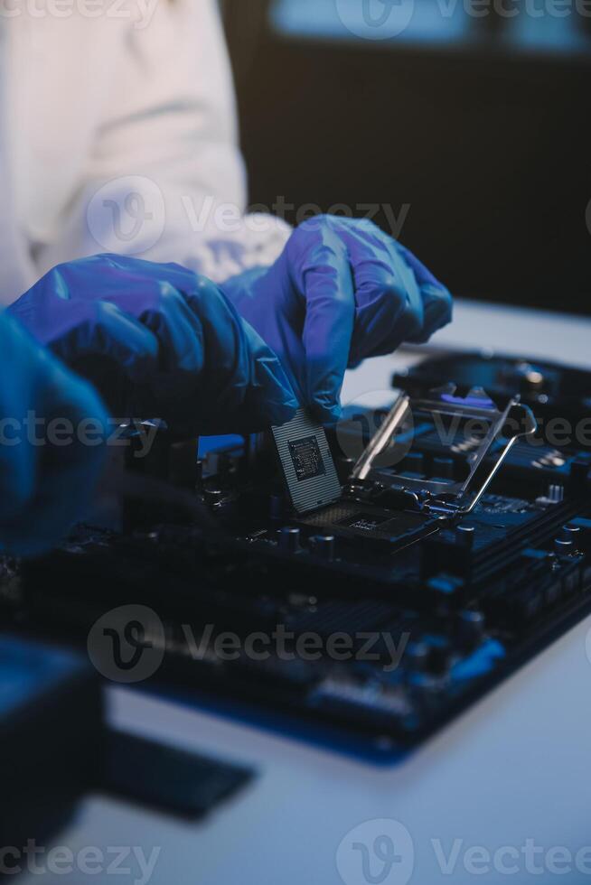 Close up of Technician measuring voltage electronic circuit board television, Service after sale fix electric equipment within insurance. photo