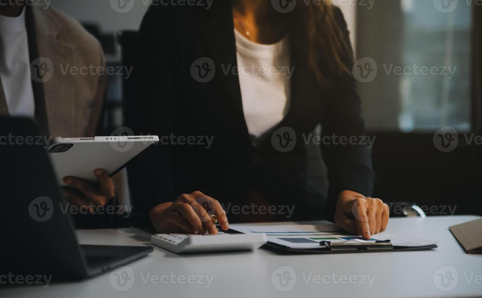 Team of business people working together in the meeting room office, teamwork background charts and graphs banner, double exposure successful teamwork,business planning concept. photo