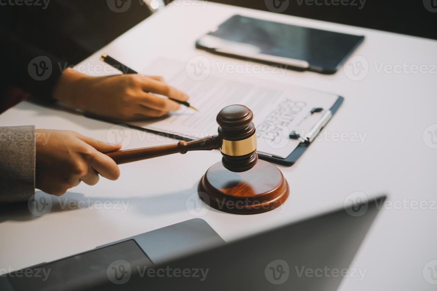 Lawyer, legal advisor, businessman brainstorming information on agreement details Business contracts in legal processing books for accuracy in contract documents. joint financial investment. photo