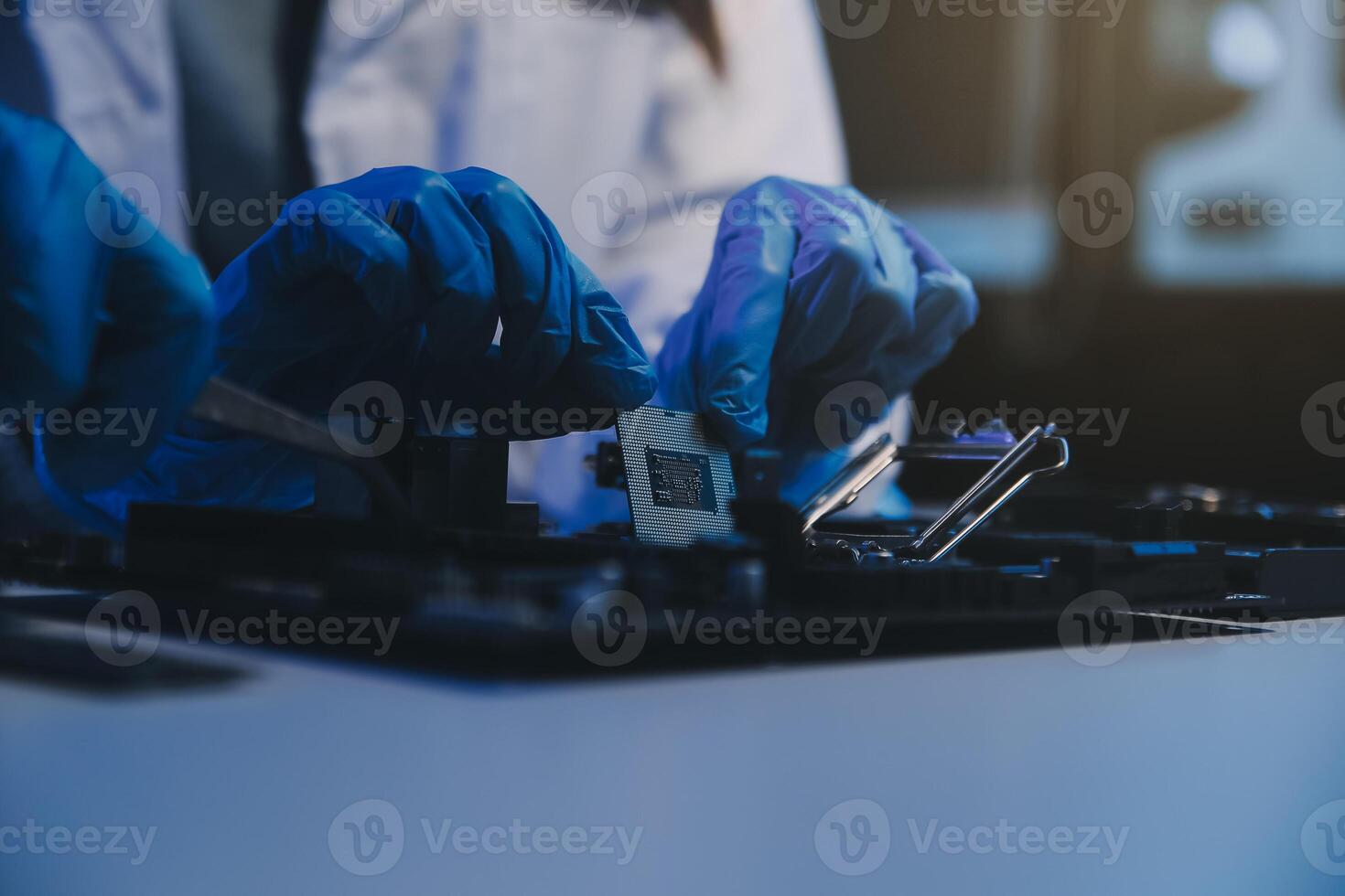 Close up of Technician measuring voltage electronic circuit board television, Service after sale fix electric equipment within insurance. photo