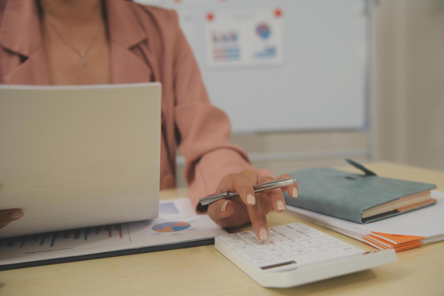 Business Documents, Auditor businesswoman checking searching document legal prepare paperwork or report for analysis TAX time,accountant Documents data contract partner deal in workplace office photo