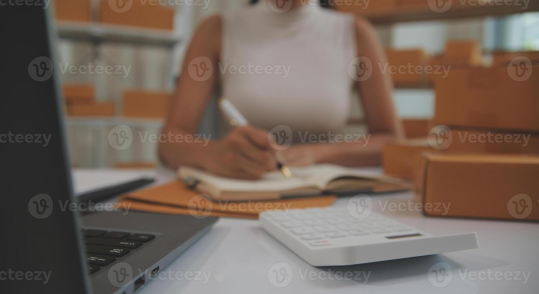 Portrait of young business asian woman online working in office desk use computer copyspace. Success business people employee, freelance SME online marketing work at home, coworking space concept photo