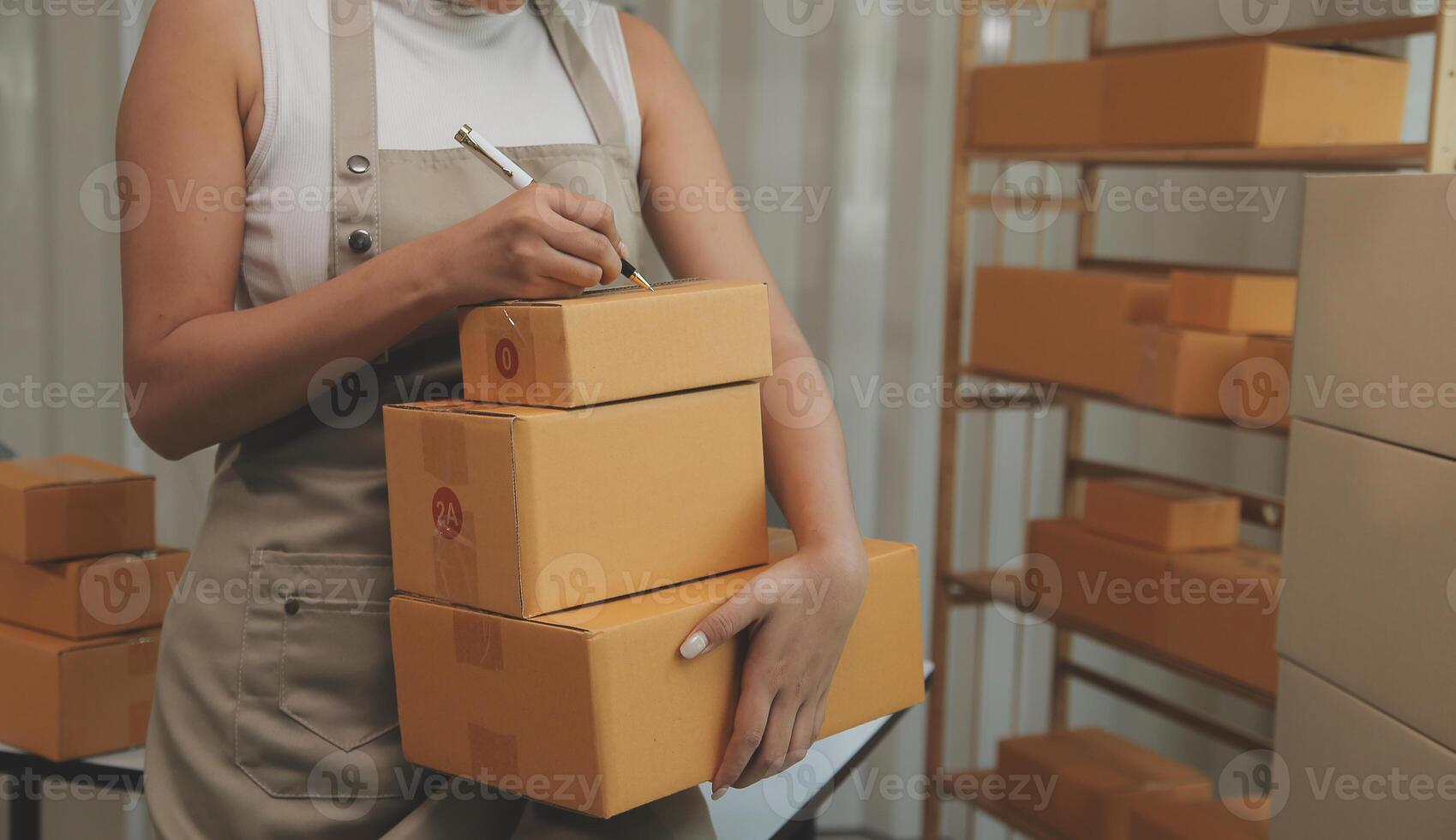 Portrait of young business asian woman online working in office desk use computer copyspace. Success business people employee, freelance SME online marketing work at home, coworking space concept photo
