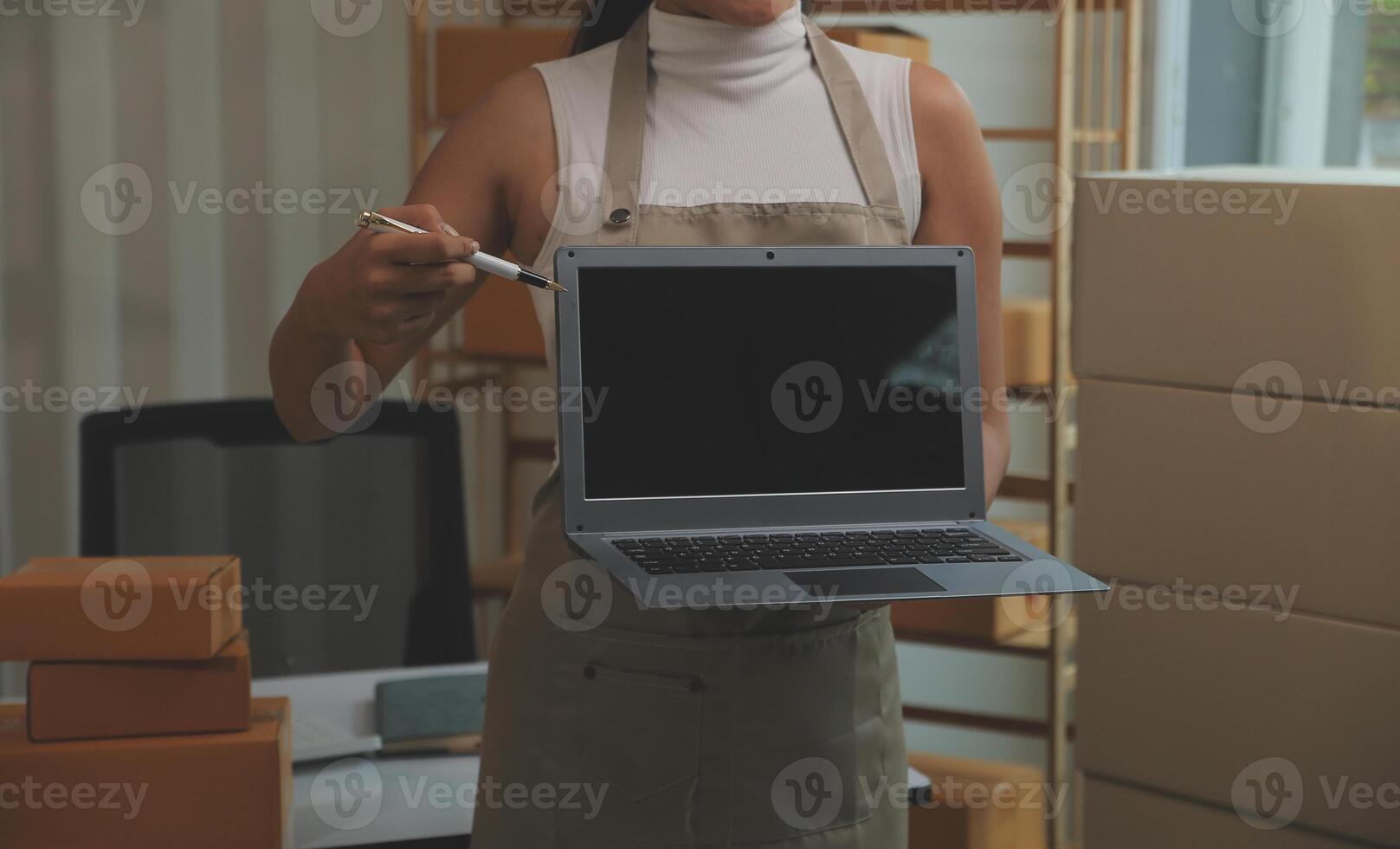 Portrait of young business asian woman online working in office desk use computer copyspace. Success business people employee, freelance SME online marketing work at home, coworking space concept photo