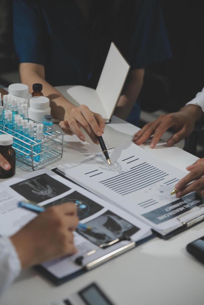Group of professional medical doctor team meeting training medical in uniform working discussing and talk with patients record, teaching medic team, sit in hospital.health medical care concept photo