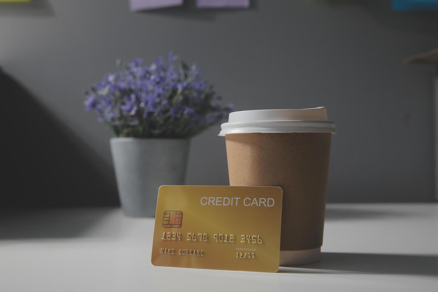 close up on calculator with group of mail letter and credit card at white table for end of the month expense day concept photo