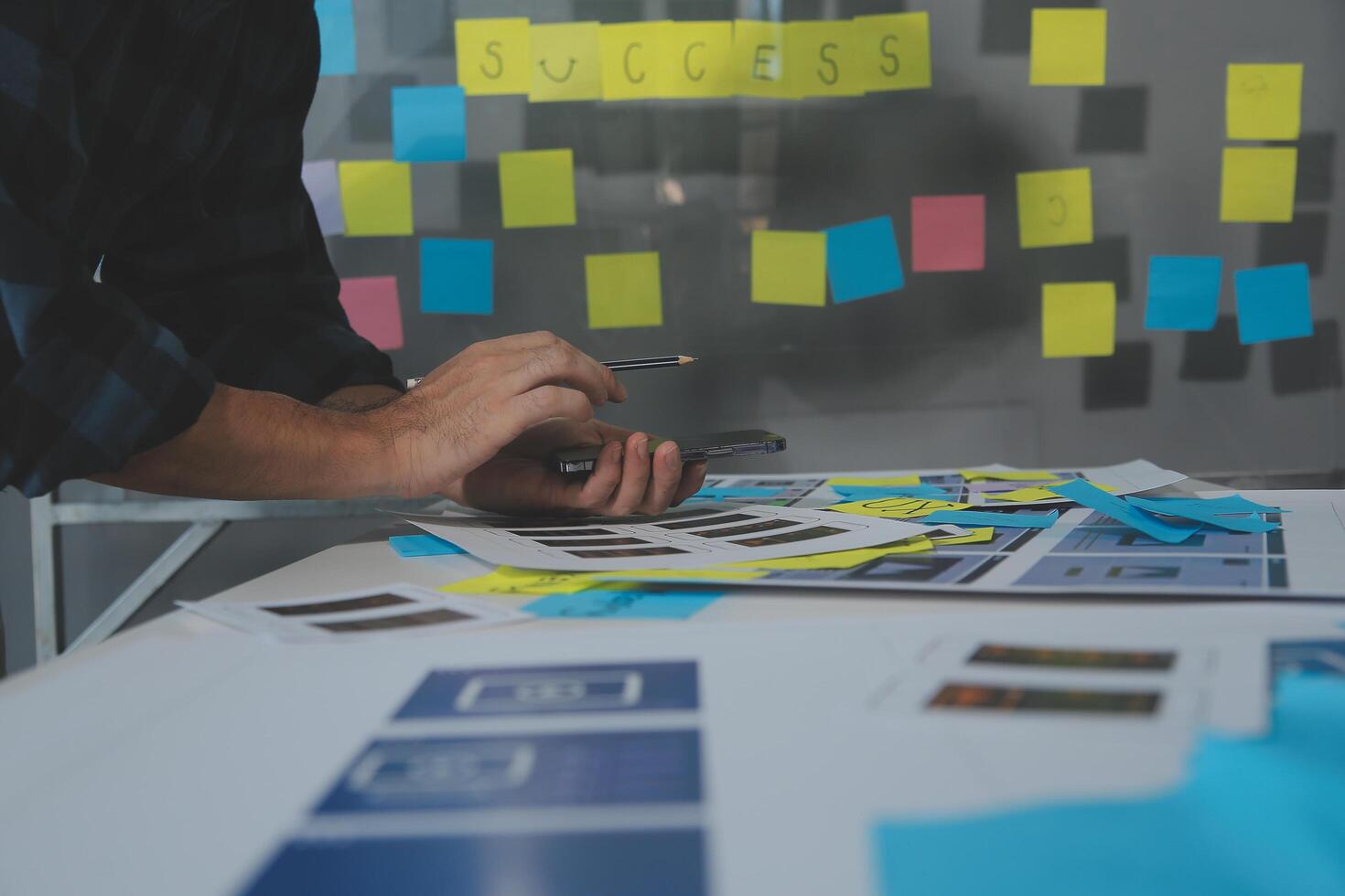 ux Graphic designer creative sketch planning application process development prototype wireframe for web mobile phone . User experience concept. photo