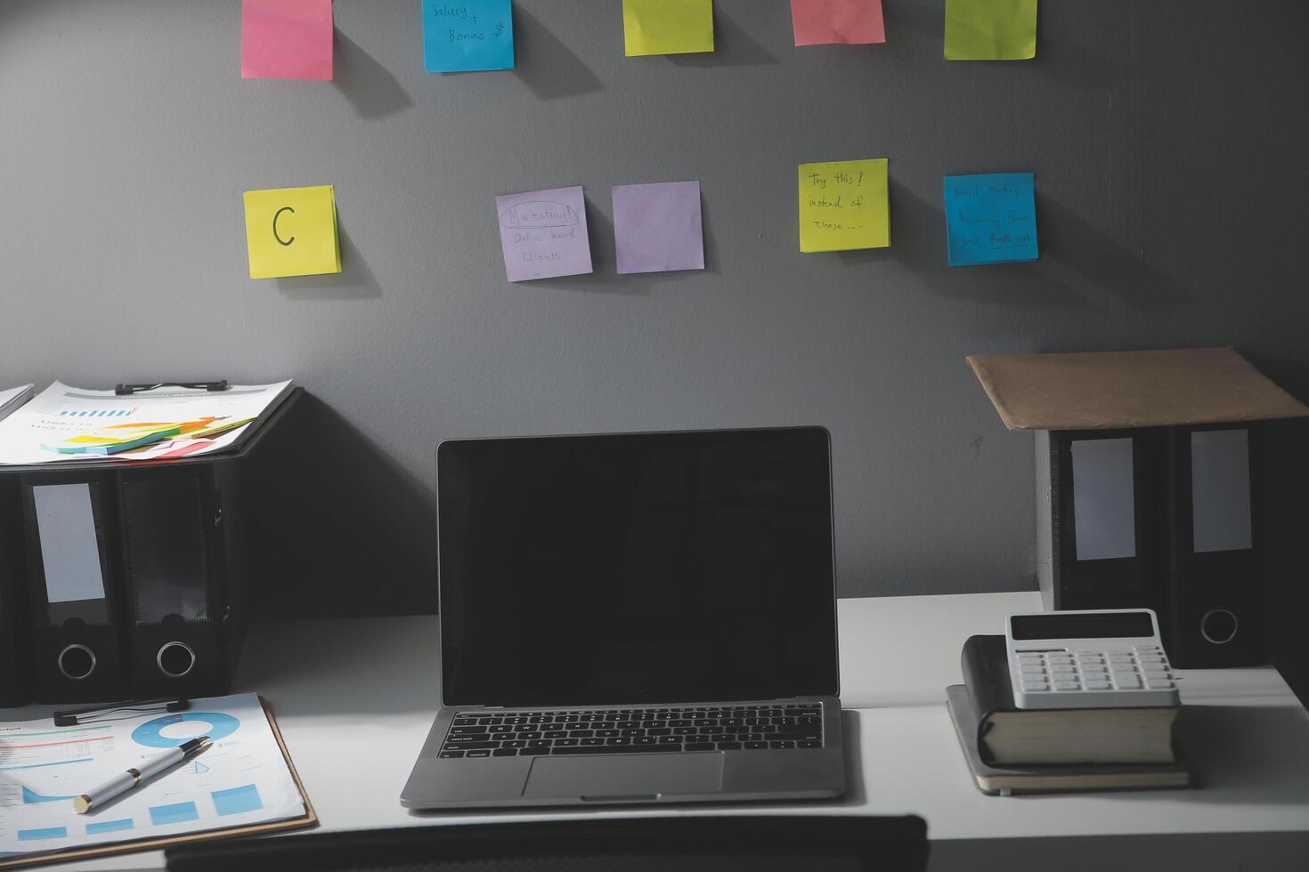 Studio workspace with laptop computer and office supplies. Work from home. With copy space photo
