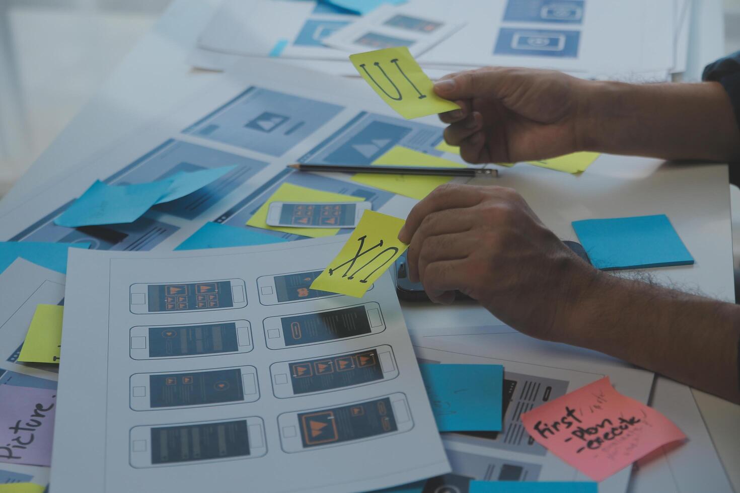 ux Graphic designer creative sketch planning application process development prototype wireframe for web mobile phone . User experience concept. photo