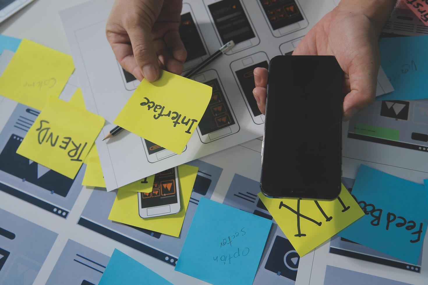ux Graphic designer creative sketch planning application process development prototype wireframe for web mobile phone . User experience concept. photo