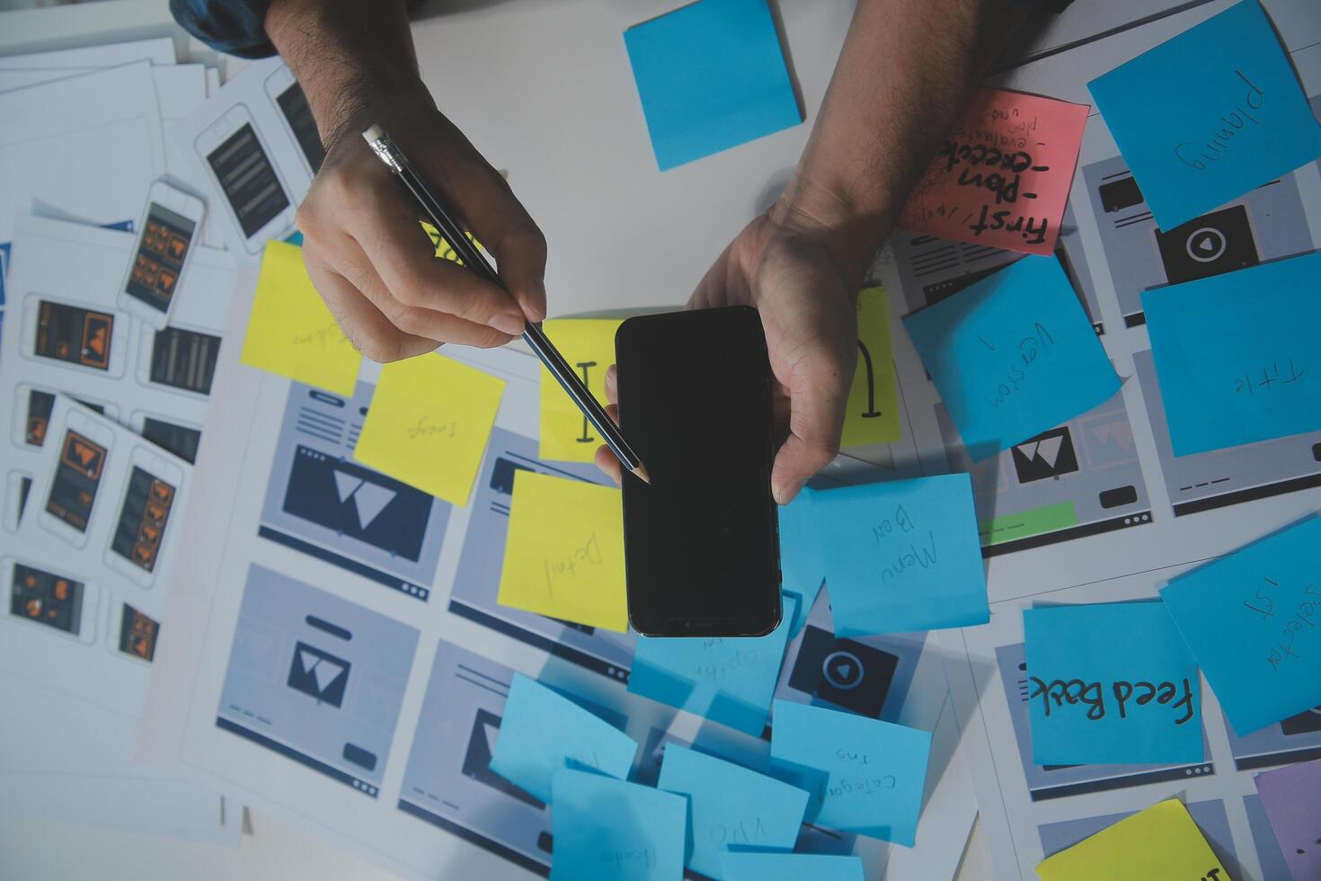 ux Graphic designer creative sketch planning application process development prototype wireframe for web mobile phone . User experience concept. photo