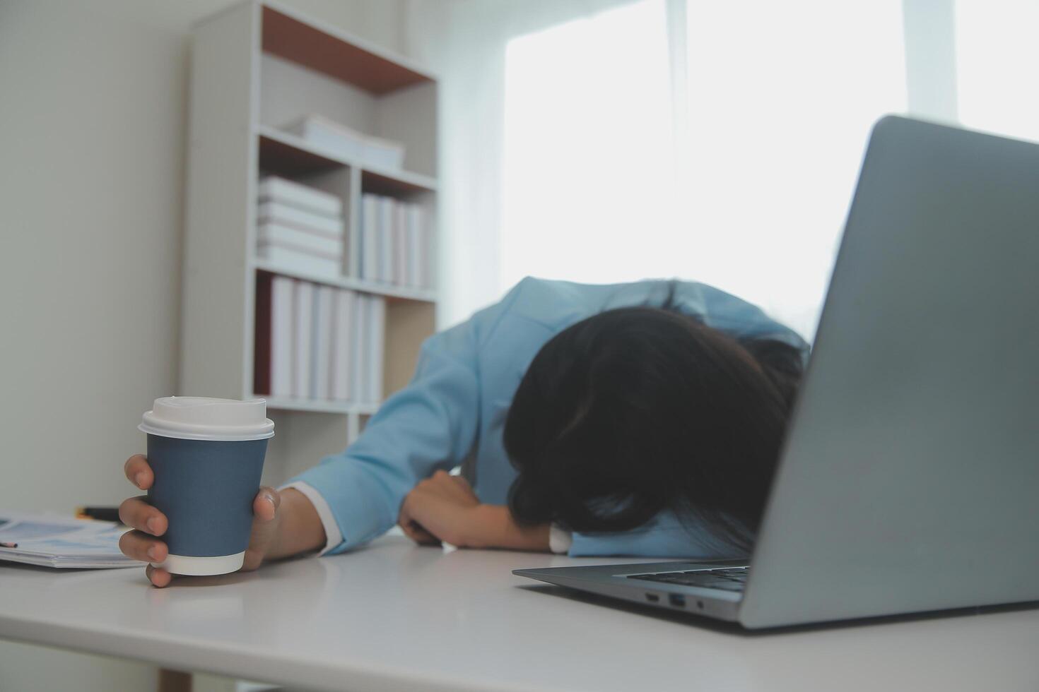 Tired teen girl rubbing dry irritable eyes feel eye strain tension migraine after computer work, exhausted young Asian woman student relieving headache pain, bad weak blurry vision, eyesight problem photo