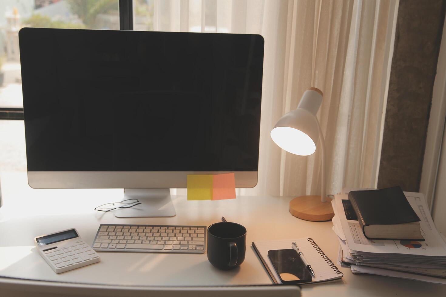 messy office workspace. Messy and cluttered office desk. Messy business office with piles of files and disorganized clutter. photo