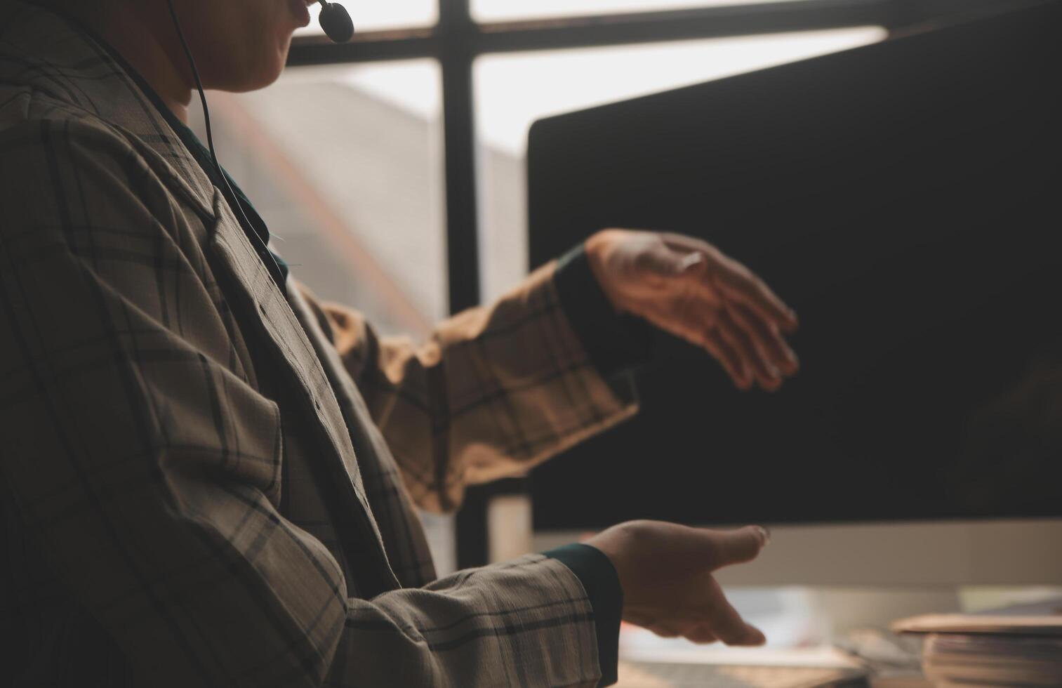 Call center, computer and business with woman in office for customer service, technical support and advice. Technology, contact us and communication with employee operator in help desk agency photo