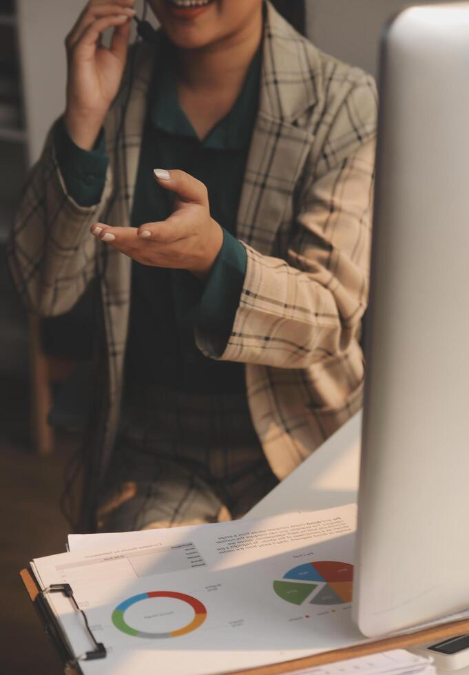 Call center, computer and business with woman in office for customer service, technical support and advice. Technology, contact us and communication with employee operator in help desk agency photo