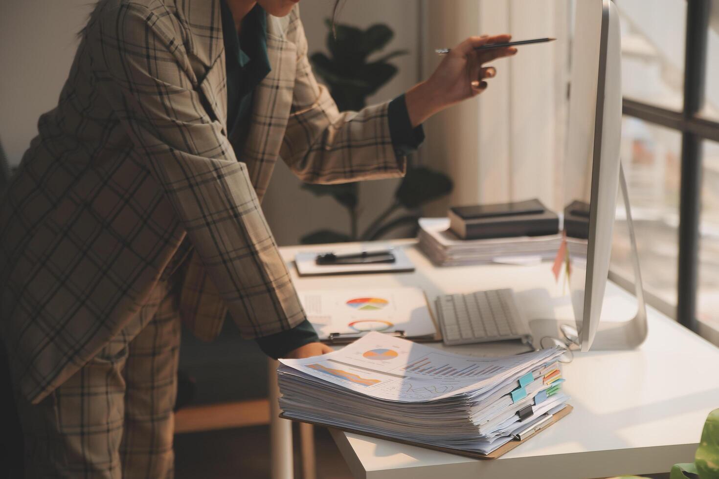 Team of business people working together in the meeting room office, teamwork background charts and graphs banner, double exposure successful teamwork,business planning concept. photo