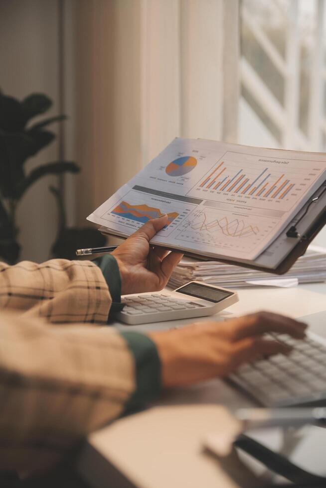 Team of business people working together in the meeting room office, teamwork background charts and graphs banner, double exposure successful teamwork,business planning concept. photo