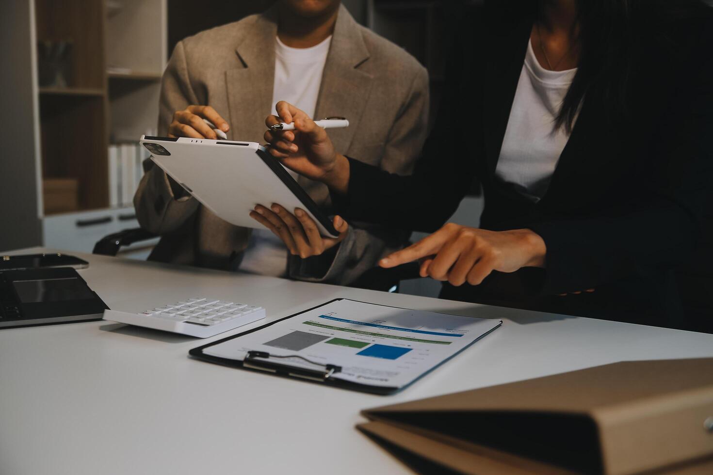 Team of business people working together in the meeting room office, teamwork background charts and graphs banner, double exposure successful teamwork,business planning concept. photo