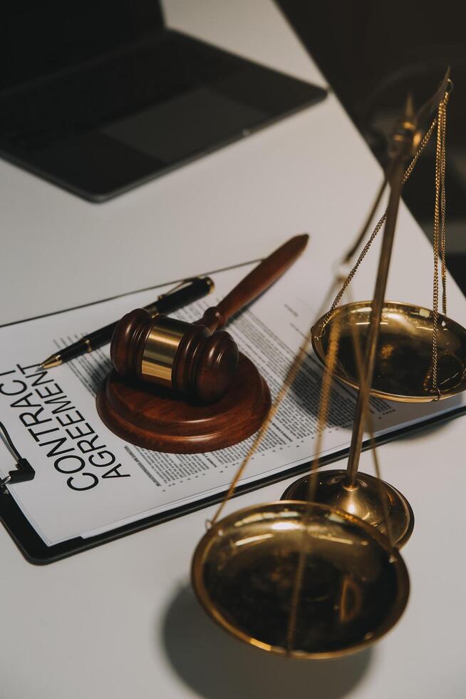 Lawyer, legal advisor, businessman brainstorming information on agreement details Business contracts in legal processing books for accuracy in contract documents. joint financial investment. photo