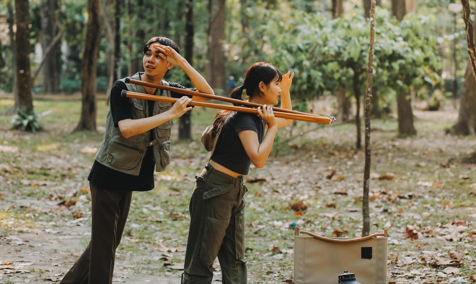 Asian couple sweet in tent inside on they camping trip, traveller relax and sleep togather in out door and camping trip photo