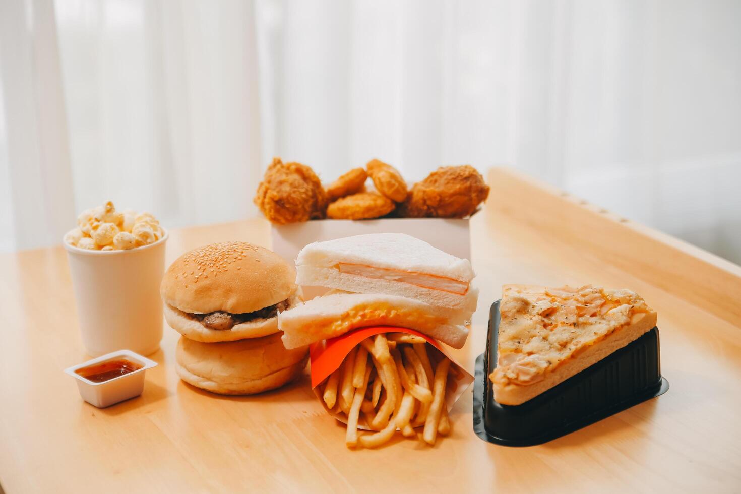 Closeup of home made burgers on wooden background photo