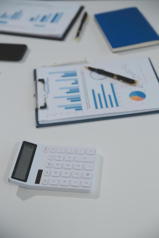 Business team collaboration discussing working analyzing with financial data and marketing growth report graph in team, presentation and brainstorming to strategy planning making profit of company. photo