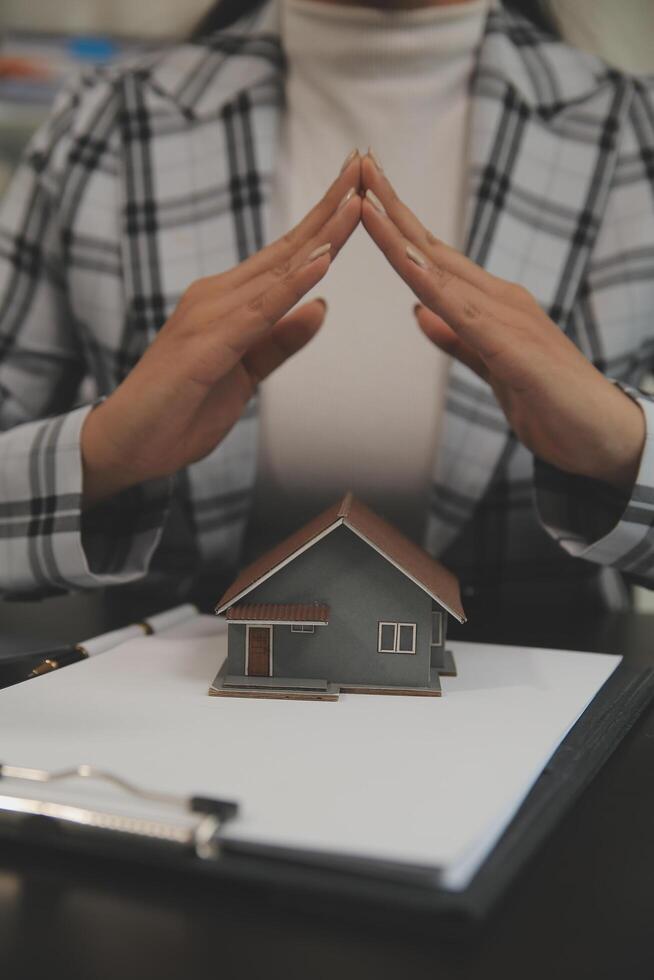 buy or sell real estate mortgage, Sale representative offer house purchase contract to buy a house or apartment and mortgage Money and Financial Concepts photo